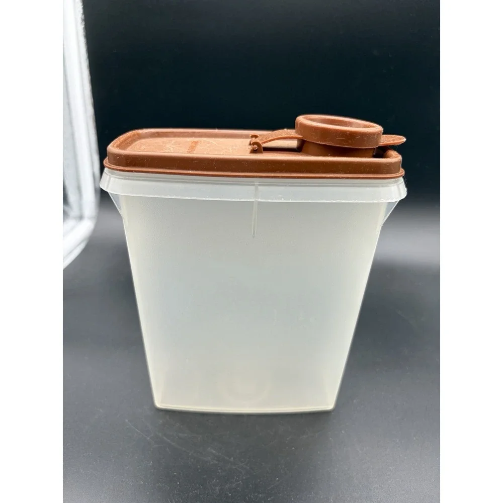 Vintage Mini Cereal Tupperware Container Bottom is 499-8 and‎ Top is 509-10.